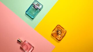 a bottle of perfume sitting on top of a table