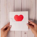 white and red heart print card