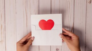 white and red heart print card