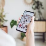 person holding white android smartphone