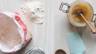 wooden ladle and spatula on top of table