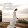 woman in white long-sleeved dress