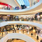 a mall filled with lots of people walking around